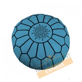 Sky blue leather pouf with black arabesques