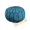 Pouf en cuir bleu ciel avec arabesques noirs